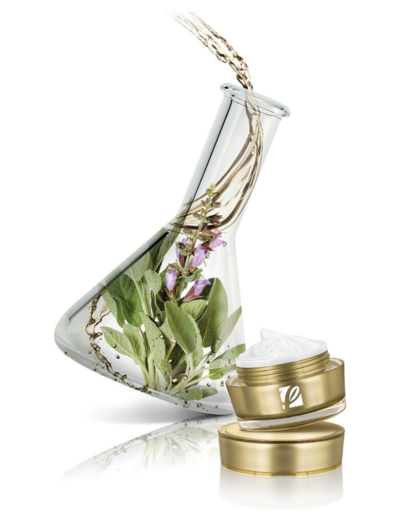 Manufacturing Excellence Image featuring a gold cream jar with product and artistic beaker in the background